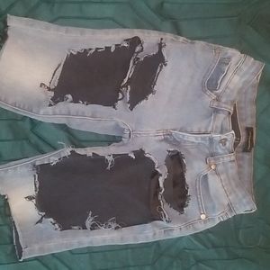 Ripped  mid length shorts